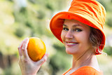 Woman  holding  the   orange