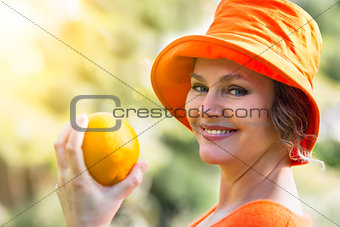 Woman  holding  the   orange