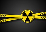 Danger tape abstract background with radiation symbol