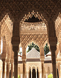Ancient carved ornament on columns in Alhambra, Spain