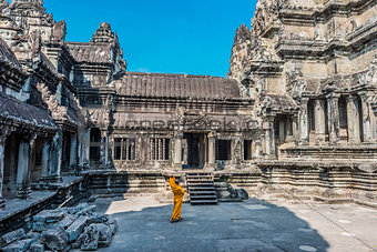 buddhist monk temple courtyard Angkor Wat Cambodia