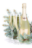 Champagne glasses, bottle and fir tree