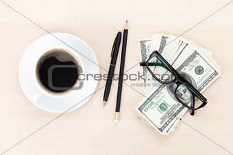 Money cash, glasses, pen and coffee cup 