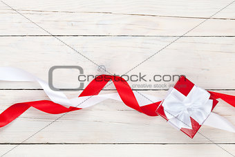 Valentines day background with gift box and ribbons