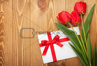 Fresh tulips and greeting card