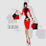 Fashion girl. Woman with shopping bags.