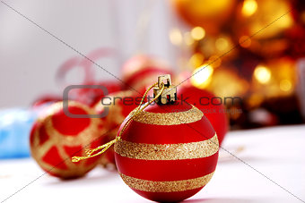 Christmas ball against light background