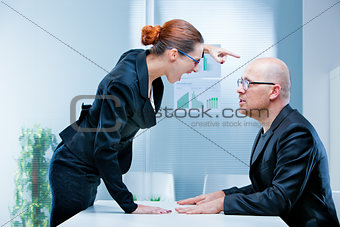 business woman shouting against a man