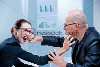 business woman fighting business man