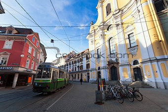 View of Annenstrasse street with typical green tram 