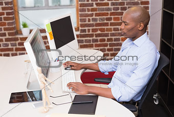 Businessman using computer in office