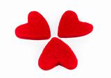 Three red hearts isolated