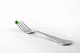 single pea on fork