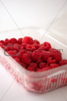 tub of raspberries