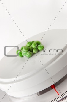 peas on kitchen scale