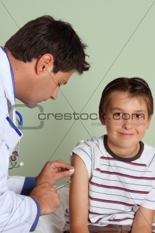 Doctor injecting child vaccine