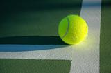 Closeup of Tennis Ball on court