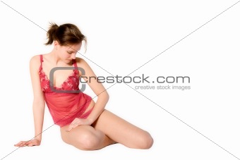 Woman in red lingerie looking down