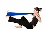 Woman is stretching her leg with a Resistance Band