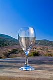 empty wine glass against landscape