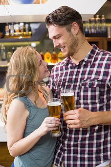 Young couple having a drink together