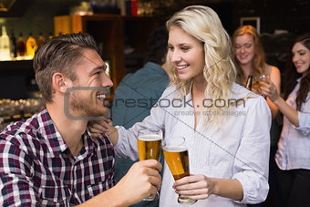 Young couple having a drink together