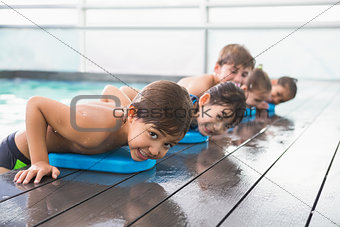 Cute swimming class at the pool