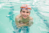 Cute little boy in the swimming pool
