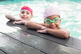 Cute little girls in the swimming pool