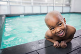 Little boy smiling in the pool