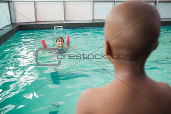 Little boys swimming in the pool