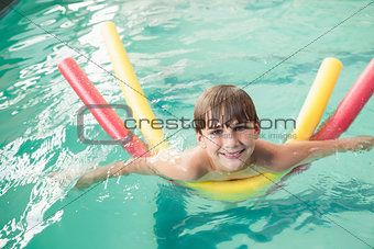 Little boy swimming in the pool