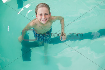 Little boy swimming in the pool