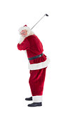 Santa Claus swings his golf club
