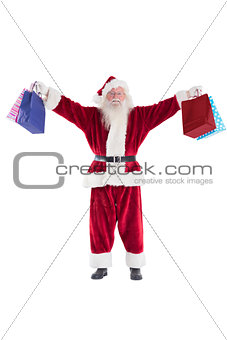 Santa holds some bags for Chistmas