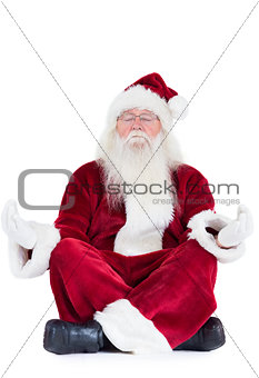 Santa Claus sits and meditates