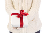 Close up of a festive woman offering gift