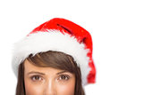 Close up portrait of pretty woman in santa hat