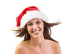 Close up portrait of pretty woman in santa hat