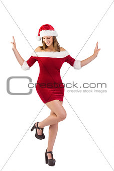 Smiling santa girl posing with hands