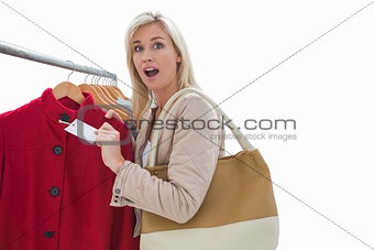 Pretty blonde shocked at price of jacket