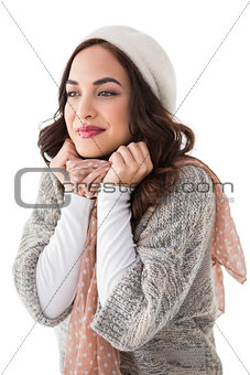 Portrait of a pretty brunette in winter clothes