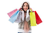 Brunette in winter clothes with shopping bags