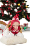 Festive little girl in hat and scarf