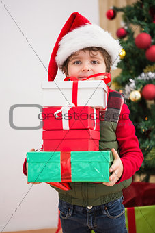Cute festive little boy smiling at camera
