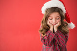 Sad little girl in santa hat