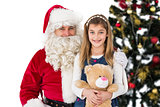 Little girl with santa claus