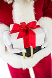 Santa claus holding a present