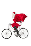 Santa claus delivering gifts with bicycle