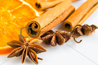 anise stars and cassia cinnamon with dried orange rings